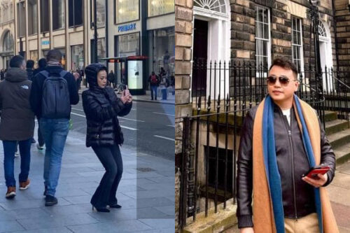 Phương Oanh bị bắt gặp cảnh đang chăm chú chụp ảnh cho Shark Bình